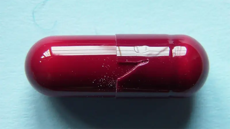 Tri automatique des gélules déformées sur le diamètre