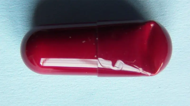 Tri automatique des gélules déformées sur le diamètre